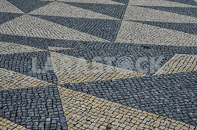 Традиційна португальська кам'яна мозаїка калсада в Лісабоні