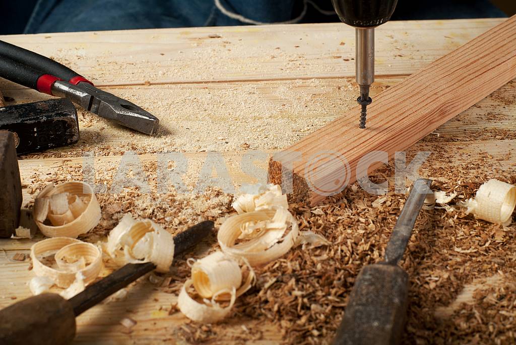 Carpenter tools on wooden table with sawdust. Circular Saw. — Image 43030