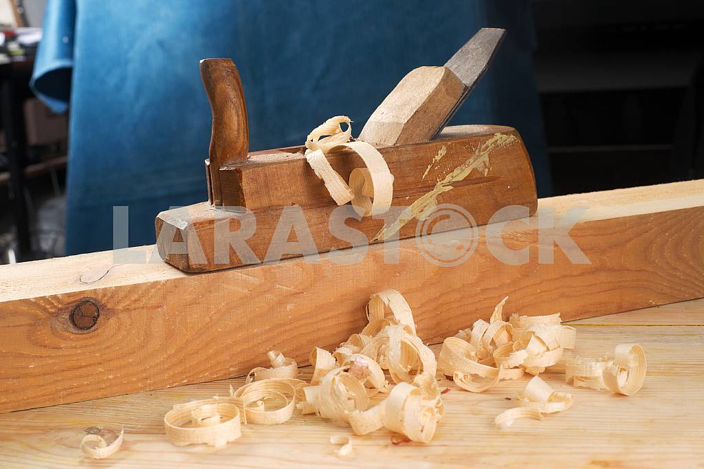Carpenter tools on wooden table with sawdust. Circular Saw. — Image 42890