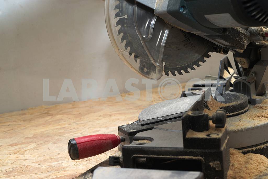 Carpenter tools on wooden table with sawdust. Circular Saw. — Image 42792