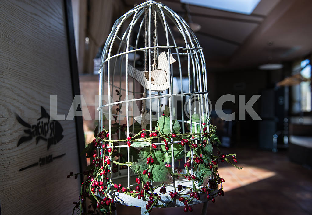 Cage with decorative bird — Image 27418