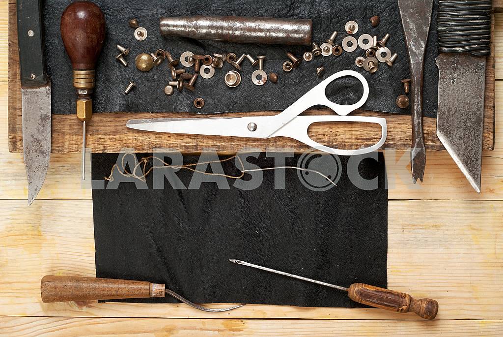 Carpenter tools on wooden table with sawdust. Circular Saw. — Image 43209