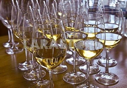 Glasses with wine on table