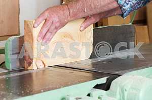 Carpenter tools on wooden table with sawdust. Circular Saw. Carpenter workplace top view