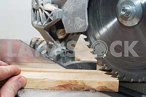 Carpenter tools on wooden table with sawdust. Circular Saw.