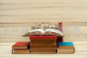 Stack of hardback books isolated on white background. Back to school. Copy space
