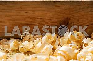 Carpenter tools on wooden table with sawdust. Circular Saw.