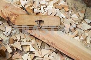 Different construction tools on a wooden background - screwdriver, caliper.