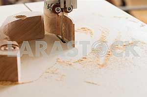 Carpenter tools on wooden table with sawdust. Circular Saw. Carpenter workplace top view