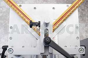 Carpenter tools on wooden table with sawdust. Circular Saw.
