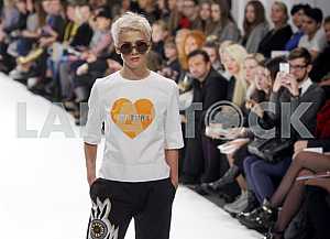The model demonstrates outfit by Ukrainian designer Larisa Lobanova