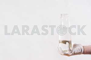 Hand with bottle of water