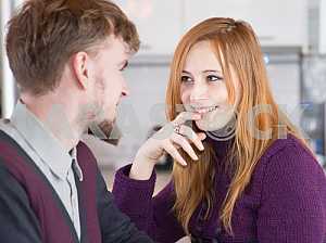 Young happy couple drinking tea in the morning