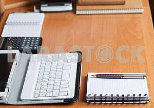 Stack of hardback books on wooden table. Back to school. Copy space. Top view