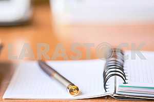 Stack of hardback books on wooden table. Back to school. Copy space. Top view