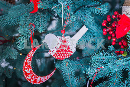 Pine-tree decoration stylish, red  and white bird and moon, Christmas tree close-up