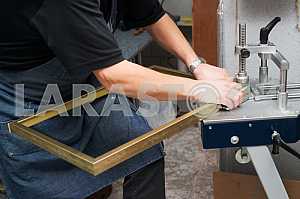 Different construction tools on a wooden background - screwdriver, caliper.