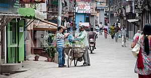 Street with two cyclists.