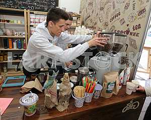 Barista prepares coffee