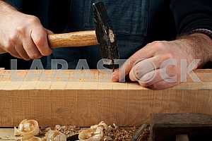 Carpenter tools on wooden table with sawdust. Circular Saw.