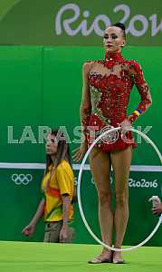 Anna Rizatdinova performs exercises with a hoop
