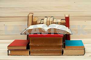 Stack of hardback books isolated on white background. Back to school. Copy space
