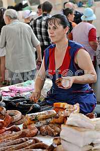 A woman sells meat on the market July 5, 2012
