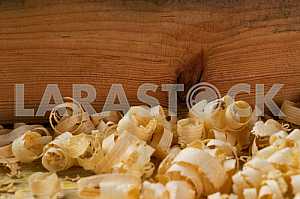 Carpenter tools on wooden table with sawdust. Circular Saw.
