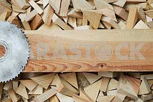 Different construction tools on a wooden background - screwdriver, caliper.