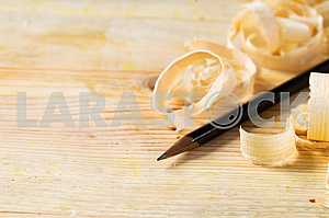 Carpenter tools on wooden table with sawdust. Circular Saw.