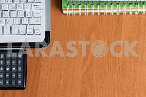 Stack of hardback books on wooden table. Back to school. Copy space. Top view