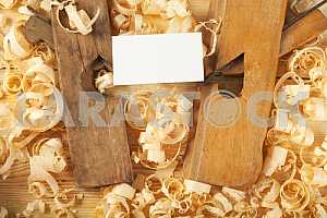 Carpenter tools on wooden table with sawdust. Circular Saw.