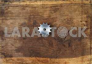 Different construction tools on a wooden background - screwdriver, caliper.