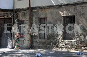 A woman walking on the street in Odessa