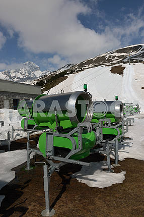 snow cannons in the mountains in spring