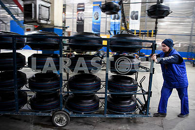 Worker with tires
