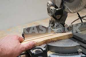 Carpenter tools on wooden table with sawdust. Circular Saw.