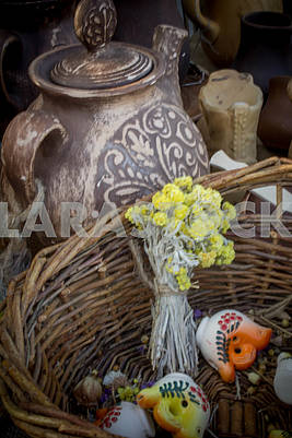 Ukrainian clay teapot with basket