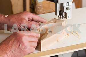 Carpenter tools on wooden table with sawdust. Circular Saw. Carpenter workplace top view