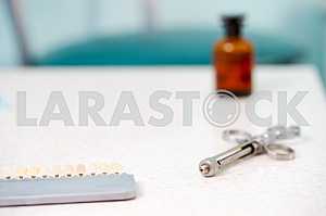 Stomatological instrument in the dentists clinic. Operation, tooth replacement.