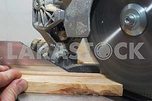 Carpenter tools on wooden table with sawdust. Circular Saw.