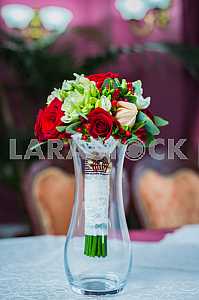 Wedding Bouquet with hands on it, rings