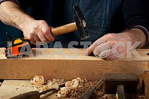 Carpenter tools on wooden table with sawdust. Circular Saw.