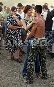 Young couple dancing barefoot