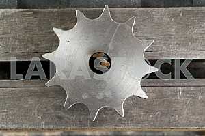 Different construction tools on a wooden background - screwdriver, caliper.