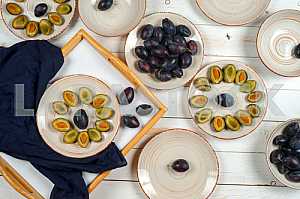 Blank white dish on a wood background.