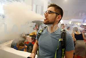 People smoke electronic cigarettes
