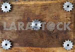 Different construction tools on a wooden background - screwdriver, caliper.