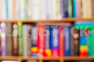 Stack of hardback books on wooden table. Back to school. Copy space. Top view