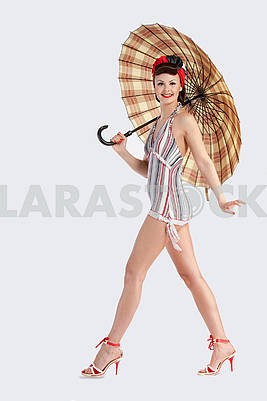 Pinup model with umbrella